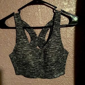 Sports bra body wing lining; stretchy.   Gently worn